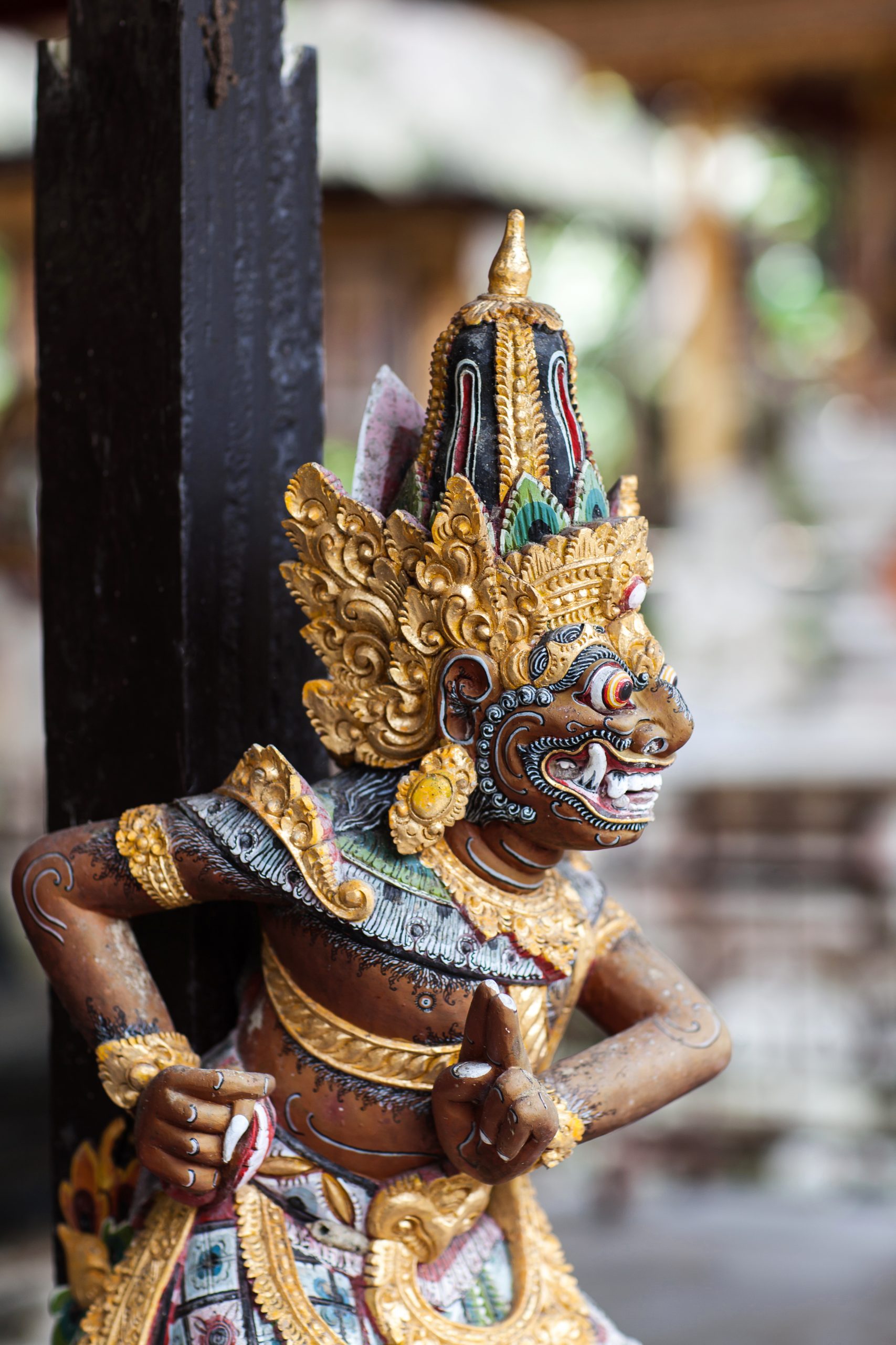 Wooden statuette of the deity in a Balinese temple