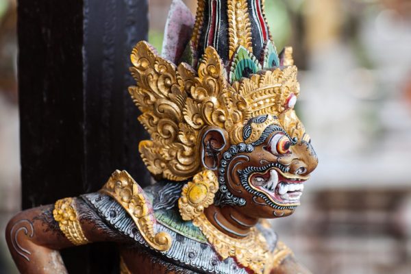 Wooden statuette of the deity in a Balinese temple